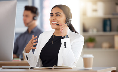 Image showing Woman, call center and computer with headset consulting in telemarketing, customer service or support at office. Happy female consultant talking on mic sitting by desktop PC in contact us for sales