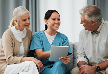 Image showing Asian nurse, senior man and woman with tablet for consulting, healthcare or report for medical help. Japanese doctor, couple or digital touchscreen ux in consultation room, happy or smile for results