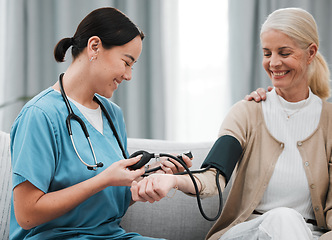 Image showing Nurse, doctor or old woman with blood pressure test consulting in hospital to monitor heart wellness. Healthcare, hypertension consultation or medical physician with a happy patient for examination