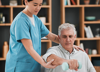 Image showing Senior man, dumbbell and physiotherapy rehabilitation nurse help for fitness, muscle and support. Healthcare physiotherapist woman with elderly patient for physical therapy and stretching exercise
