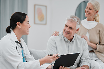 Image showing Nurse, medical and consulting with a senior couple in their home, talking to a medicine professional. Healthcare, insurance or life cover with a mature man and woman meeting a medicine professional