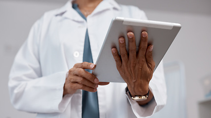 Image showing Hands, tablet and medical doctor in hospital for research, telehealth or online consultation. Healthcare, technology and senior woman or female physician with digital touchscreen for wellness app.
