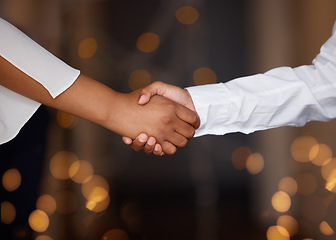 Image showing Partnership, deal and business people shaking hands in a office with a bokeh background. Welcome, greeting and team doing a handshake gesture for connection, agreement or onboarding in the workplace.