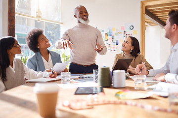 Image showing Creative business people, meeting and planning in fashion design, brainstorming or strategy at office. Senior, black man or CEO talking to team of designers in teamwork collaboration for startup