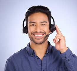 Image showing Consulting, call center and smile with portrait of man for customer service, help desk and technical support. Networking, communication and contact us with employee for sales, crm and happy in studio