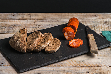 Image showing Malt loaf bread and chorizo slices