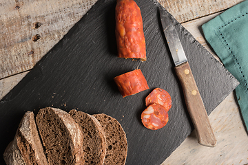 Image showing Malt loaf bread and chorizo slices