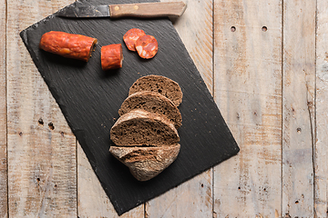 Image showing Malt loaf bread and chorizo slices