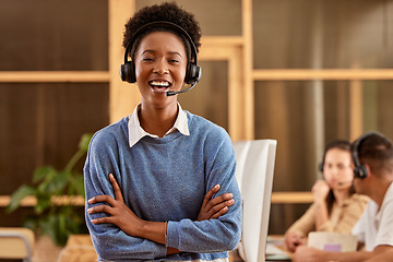 Image showing Call center, arms crossed and portrait of black woman laughing at funny joke in customer service office. Crm consulting, proud sales agent and happy telemarketer, representative or female consultant.