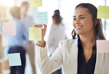 Image showing Business, brainstorming and woman writing notes of agenda, research and smile at office window. Happy project manager planning ideas on glass, timeline and strategy of mission, schedule or management