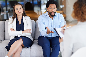 Image showing Couple therapy, relationship problem and therapist listening to marriage fight, stress and divorce counseling services. Discussion, frustrated and interracial partner or people talking in psychology