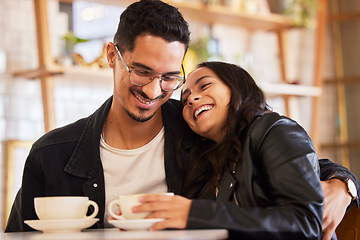 Image showing Happy, cafe and couple on coffee date in a restaurant together bonding, funny and laugh in a conversation. Flirting, love and boyfriend relax with girlfriends on weekend break by man and woman