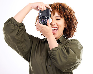 Image showing Fun, photo and portrait of a black woman with a camera isolated on a white background in a studio. Excited, professional and photographer filming, shooting and being paparazzi with equipment