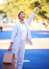 Image showing Taxi, shopping bags and retail with Asian woman in city for sales, grocery and boutique deal. Happy, smile and summer with customer and hand for travel service in outdoors for fashion, stop and gift