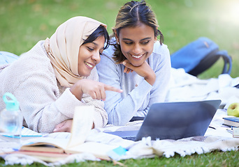 Image showing Muslim women, students or laptop pointing for learning, education or research in park, garden or college campus. Smile, happy or Islamic university friends on streaming technology or studying bonding