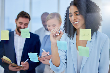 Image showing Teamwork, brainstorming and business people in meeting with idea, sticky notes and planning in glass office. Collaboration, diversity and group of workers working on project, thinking and strategy