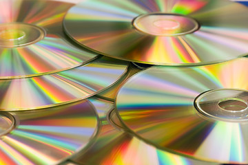 Image showing cd's in golden reflections