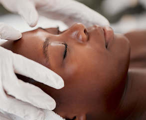 Image showing Massage, facial and relax with black woman in spa for holistic treatment, beauty and skincare. Peace, luxury and zen with girl customer in salon for cosmetology, wellness and physical therapy