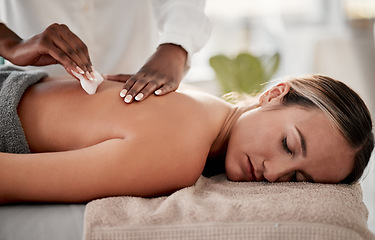Image showing Spa, skincare and massage for woman with gua sha product for back pain, muscle and tension relief. Beauty salon, relax and girl with masseuse on a table with tool for spine, joint and inflammation
