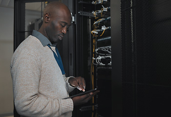 Image showing Engineer, server room or black man with tablet for database connection cable, maintenance or software update at night. Cybersecurity, IT and male coder with technology for networking in data center.