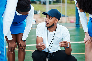 Image showing Coach, strategy and teamwork with sports people listening to tactics or instructions on a court. Fitness, team and planning with a black man talking to a group of girls during a competition