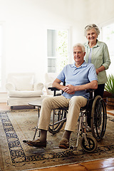 Image showing Disability, smile and portrait of senior couple at home for marriage, quality time and bond together. Retirement, wheelchair and happy elderly woman and man in living room to relax, support and love