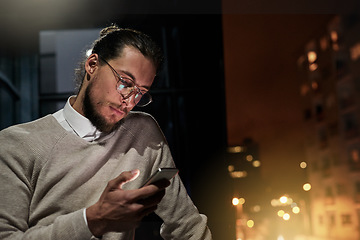 Image showing Smartphone, city and business man at night for internet research, mobile app and social media on balcony. Technology, communication and male with phone for writing email, networking and online chat