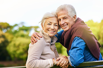 Image showing Old couple in portrait, relax in the park with smile, happiness together with bonding in nature, love and retirement. Happy, man and woman with travel, relationship with marriage and commitment