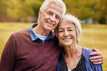 Image showing Hug, senior and portrait of a couple in a park to relax, be happy and bonding in Norway. Love, smile and elderly man and woman hugging, giving affection and together in nature during retirement