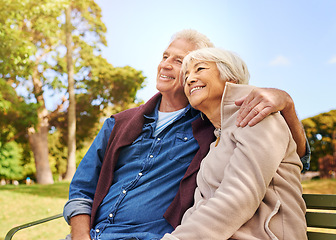 Image showing Old couple, hug and relax in the park with smile, happiness together with bonding in nature, love and retirement. Happy, man and woman with travel, relationship with trust in marriage and commitment