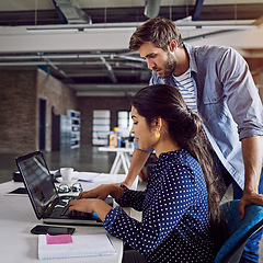 Image showing Team, laptop and web designer at startup with collaboration, typing and webdesign, work together and digital marketing. Meeting, man and woman at modern office with partnership, strategy and internet