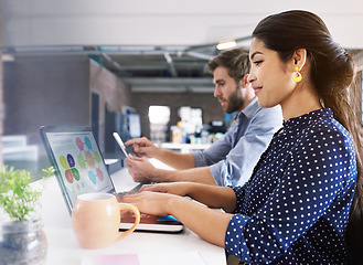 Image showing Coworking, office and woman at desk with laptop and man at creative agency working on internet project together. Leadership, partnership and teamwork, happy employees or coworkers at design startup.