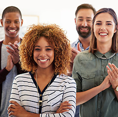 Image showing Success, applause and portrait of black woman in office for celebration, teamwork and achievement. Leadership, happy and smile with business people for creative, designer and winner in startup