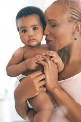 Image showing Mother, baby and black family together for love, care and support for growth and development. Happy woman and infant child in house for bonding, security and to relax with mama on mothers day