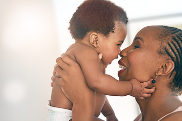 Image showing Smile, touch and nose with mother and baby for bonding, affectionate and connection in family home. Kindness, happiness and happy with black woman holding child for positive, growth and support