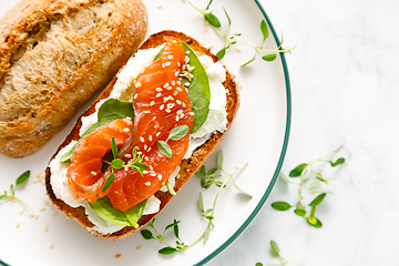 Image showing Salmon salted sandwich with spinach and cream cheese, top down view