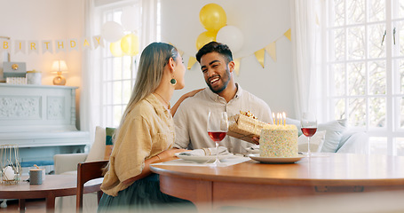 Image showing Gift, dinner and couple talking about birthday, anniversary or celebration at a dining room table in house. Happy, smile and young man and woman speaking about present, gratitude and love with food