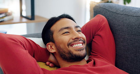 Image showing Happy, lazy and relax, a man on a sofa in living room after work. Comfort on a day off, relaxing on a couch and enjoying the weekend. Peace, quiet and time for afternoon nap in the lounge at home.