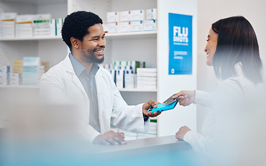 Image showing Pharmacy, payment and pharmacist with customer with card for medicine, drugs and medical prescription. Healthcare, wellness and black man help, service and smile at client with machine for medication