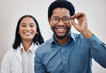 Image showing Optometry, glasses and portrait of black man and doctor for retail, choice and vision. Shopping, healthcare and medical with patient and woman for decision, frames or eye care in ophthalmology clinic