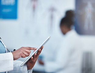 Image showing Closeup, hands and doctor with a digital tablet for planning, internet and surgery schedule in a hospital. Hand, online and search by healthcare worker checking agenda, calendar and management app