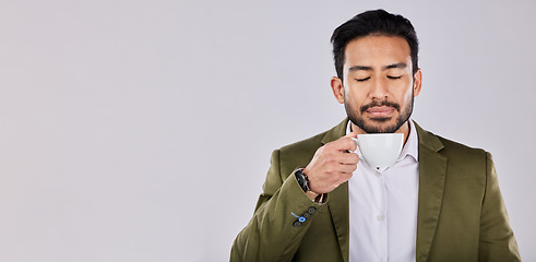 Image showing Mockup, coffee and Asian man with peace, relax and happy with guy against a grey studio background. Japan, male and gentleman with tea, peace and product placement with beverage, calm and backdrop