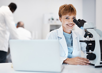 Image showing Medical science, woman and portrait with a microscope in a laboratory for research, analysis and study. Scientist person at desk with laptop in lab for development, future medicine and biotechnology