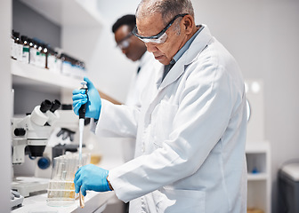 Image showing Healthcare, science and scientist with a chemical for research, medicine and physics analysis. Lab, innovation and a mature man with a liquid for chemistry test, medical education and biology