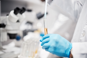 Image showing Hands, science and tube for research in lab with liquid, medicine or pharma product with gloves for safety. Innovation, scientist and chemistry in laboratory for study, pharmaceutical trial or goal