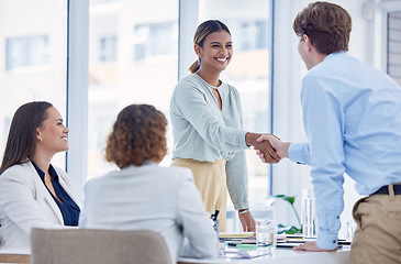 Image showing Business, handshake and staff in meeting, promotion and celebration in workplace, happiness and recruitment. Black woman, group and teamwork with gesture for partnership, collaboration and management