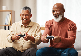 Image showing Gaming, funny and senior black man friends playing a video game together in the living room of a home. Sofa, fun or retirement with a mature male gamer and friend enjoying a house visit to game