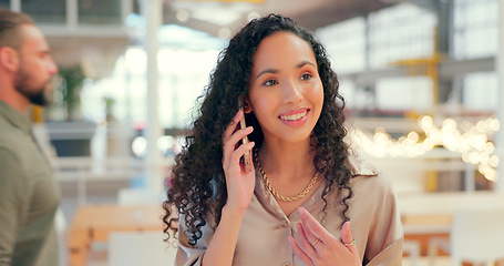 Image showing Phone call, face and happy with a business black woman in her office, talking on her mobile. Communication, networking and smile with a young female employee chatting on her smatphone at work