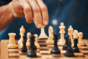 Image showing Chess, play and hands with a queen on a board game with a strategy in home competition. Checkmate, chessboard and smart man or male playing in a sports contest or problem solving challenge for mind.