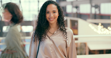 Image showing Face, smile or happy and a business black woman in a busy office with a positive mindset for company growth. Portrait, mission and vision with a female employee standing in her workplace for success